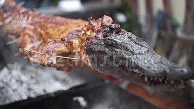 烤鳄鱼在明火上的海上美食餐厅，越南的异国风味餐，亚洲美食，生食